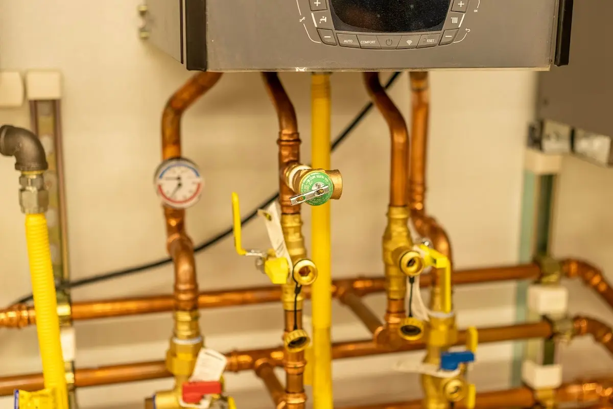 Licensed technician providing Backflow Prevention for a homeowner in Tontitown